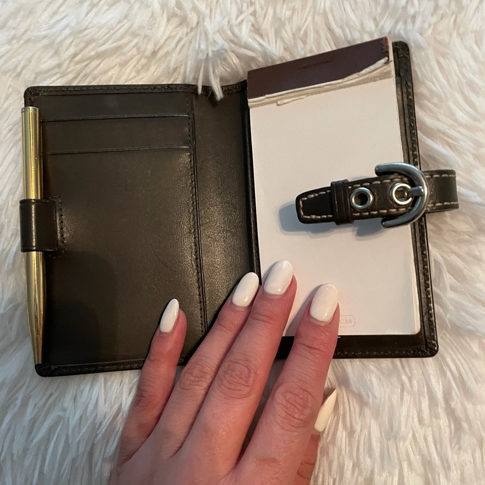 Mini Coach Wallet with notepad and pen.